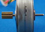 Photo of a motor with its shaft extending from front and back